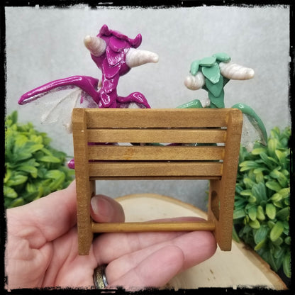 Kenty and Albury - Original Hand Sculpted Dragons on Bench