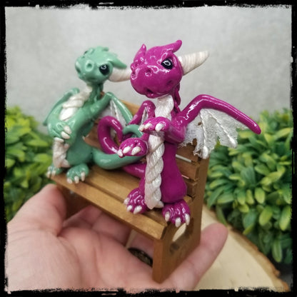 Kenty and Albury - Original Hand Sculpted Dragons on Bench