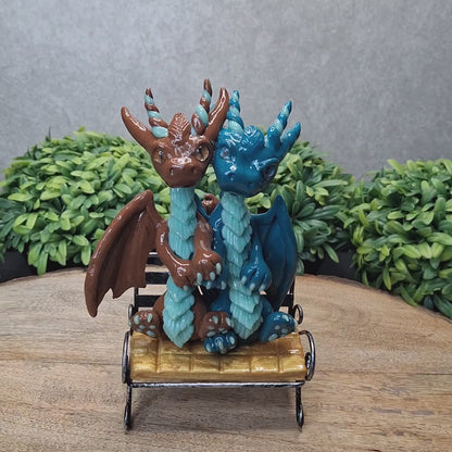 Turan and Dvaros - Original Hand Sculpted Dragons Sitting on Bench