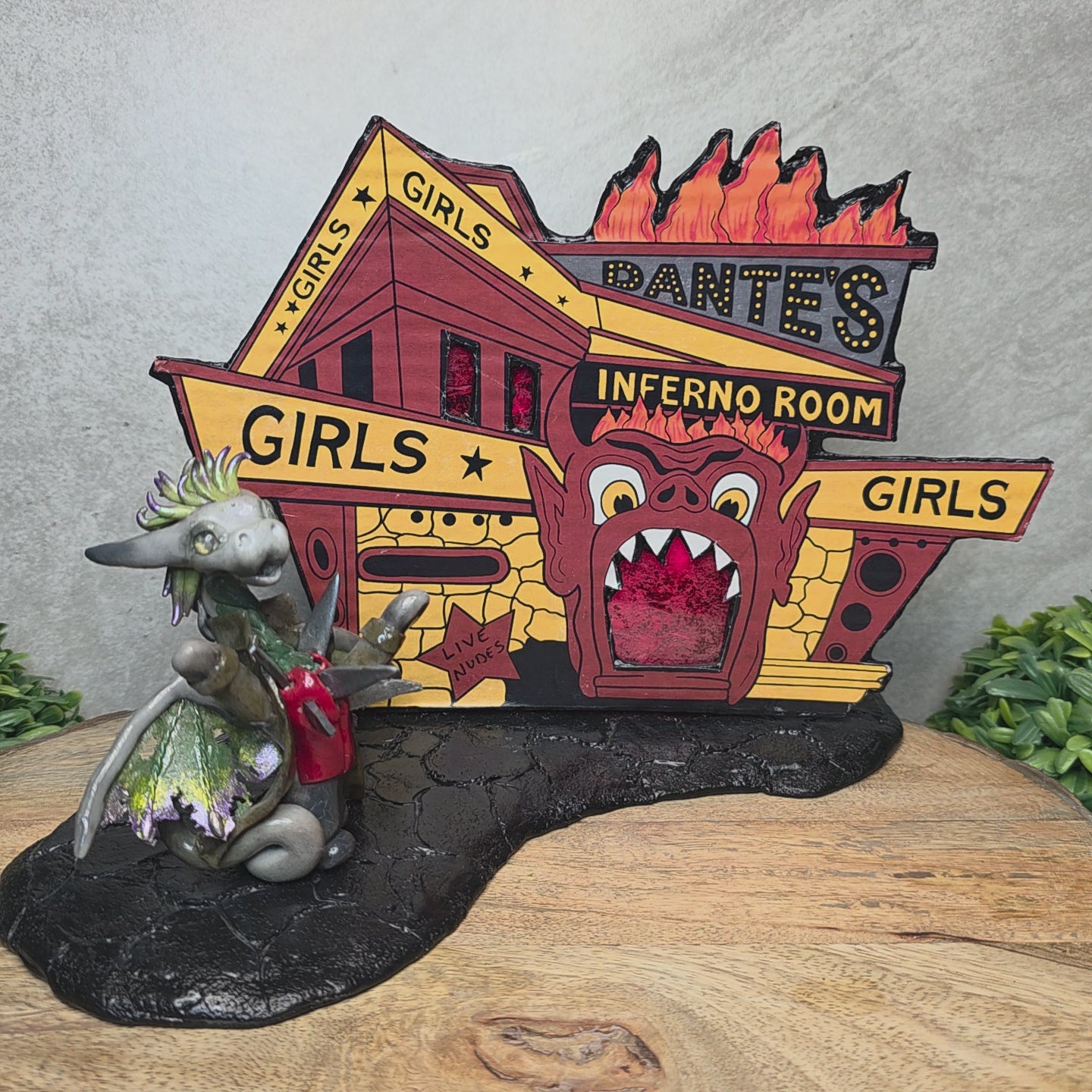 A video of a clay dragon and an inferno room backdrop