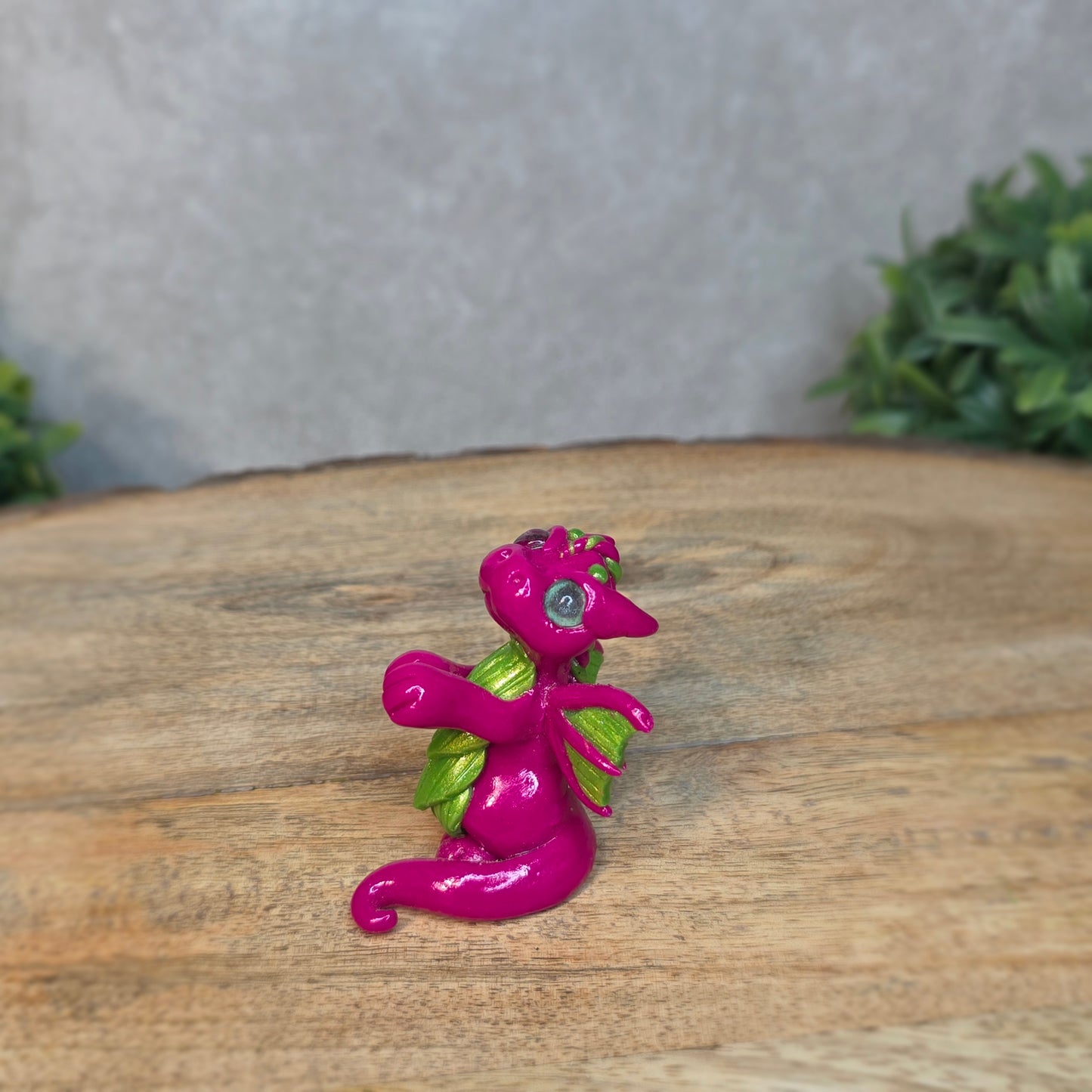 A clay dragon with a blurred background