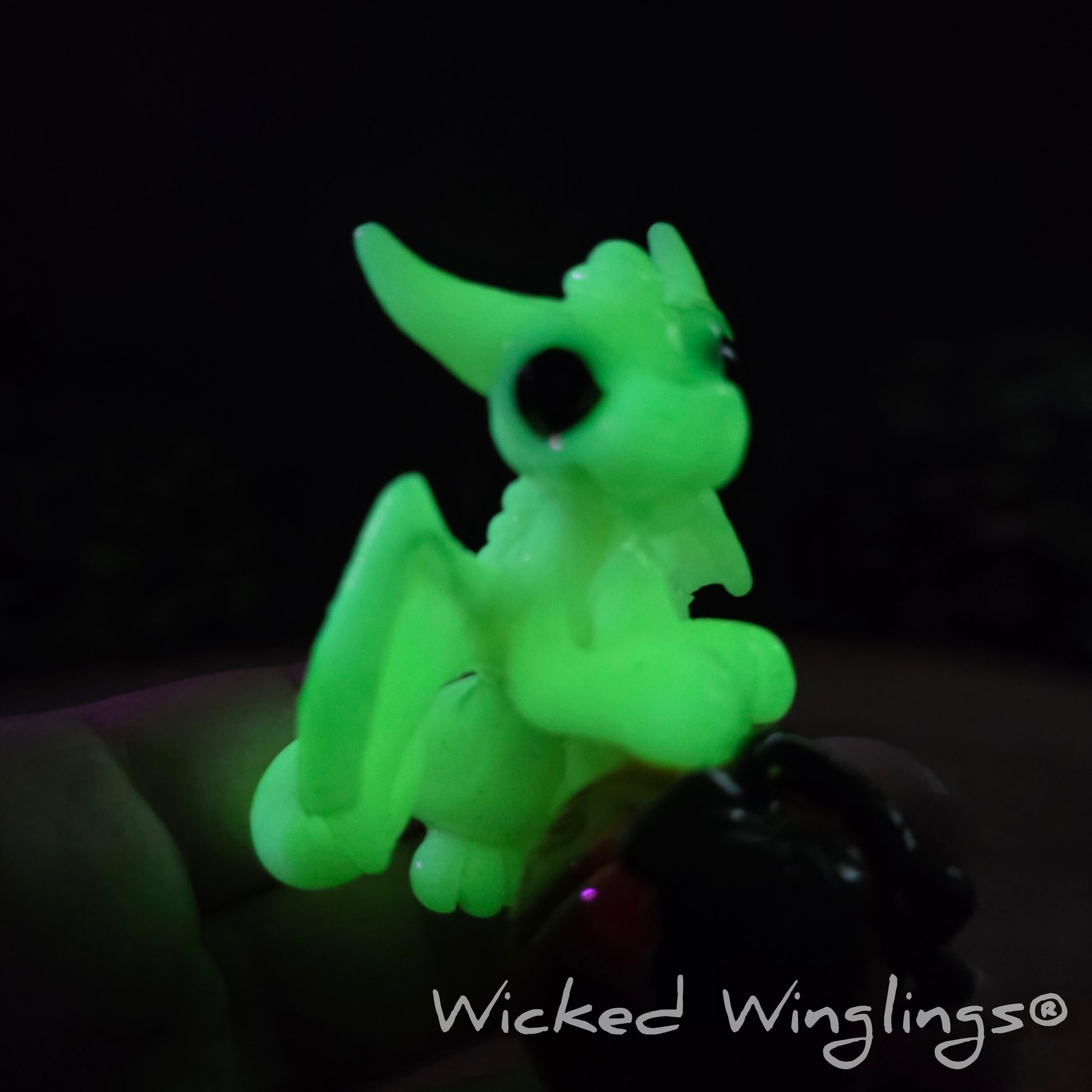 A glowing clay dragon sculpture
